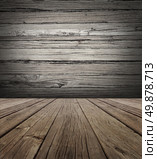 Old wood stage background with vertical natural distressed antique wooden plank floor and horizontal weathered wall as an aged grunge back drop  with copy space. Стоковое фото, агентство Ingram Publishing / Фотобанк Лори