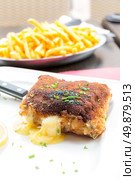 Chicken cordon bleu with deep fried potato. Стоковое фото, агентство Ingram Publishing / Фотобанк Лори