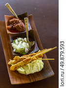 Delicious Asian Cuisine Chicken Satay Curry. Стоковое фото, агентство Ingram Publishing / Фотобанк Лори