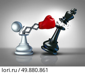 Secret weapon business concept with a chess pawn punching and destroying the competition king piece with a hidden red boxing glove as a metaphor for innovative corporate strategy and planning to win the game. Стоковое фото, агентство Ingram Publishing / Фотобанк Лори
