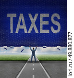Tax advice from a financial advisor as a businessman lifting up a brick wall obstacle with the word taxes on the textured surface as a metaphore for managing a budget and reducing costs. Стоковое фото, агентство Ingram Publishing / Фотобанк Лори