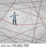 Medical solution health care concept as a doctor walking on a red tightrope or highwire around a group of tangled wires as a symbol of challenges in insurance and the risk in illness treatment for patients. Стоковое фото, агентство Ingram Publishing / Фотобанк Лори