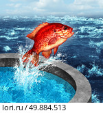 Courage concept and ambition symbol as a red fish jumping out of an artificial pool to join the natural blue ocean or farm raised seafood social issue. Стоковое фото, агентство Ingram Publishing / Фотобанк Лори