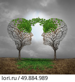 Mutual support and saving one another as a benefit to each other business concept as two sick trees with new leaves growth emerging shaped as a human head providing a revival for success. Стоковое фото, агентство Ingram Publishing / Фотобанк Лори
