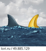Unfair negotiation business concept and out of your league symbol as a shark fin facing off with a similar shaped banana as a metaphor for lack of skills and vulnerable negotiating icon for a contract or agreement. Стоковое фото, агентство Ingram Publishing / Фотобанк Лори