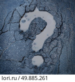 Road construction concept and city maintenance of infrastructure symbol as broken pavement or asphalt shaped as a question mark pot hole or damaged street as an icon for highway safety questions. Стоковое фото, агентство Ingram Publishing / Фотобанк Лори