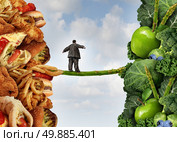 Diet change healthy lifestyle concept and having the courage to accept the challenge of losing weight and fighting obesity and diabetes as an overweight person walking on a highwire asparagus from fatty food towards vegetables and fruit. Стоковое фото, агентство Ingram Publishing / Фотобанк Лори