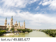 Our Lady of the Pillar Basilica with Ebro River Zaragoza, Spain. Стоковое фото, агентство Ingram Publishing / Фотобанк Лори