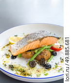 grilled salmon steak with pesto sauce. Стоковое фото, агентство Ingram Publishing / Фотобанк Лори
