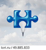 Leadership jigsaw puzzle concept as a solution metaphor with a businessman floating up to the sky with a balloon shaped as a fundamental key link unit to complete a project. Стоковое фото, агентство Ingram Publishing / Фотобанк Лори