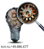 Creative decline and outdated and obsolete ideas concept as a lightbulb made of mechanical gears with a magnigying glass showing a closeup of rust and neglect as a business metaphor for losing competitivness and declining innovation. Стоковое фото, агентство Ingram Publishing / Фотобанк Лори