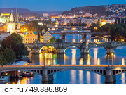 view of Bridges on Vltava, Prague at dusk, Czech Republic. Стоковое фото, агентство Ingram Publishing / Фотобанк Лори