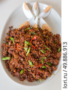Crispy fried fish - Thai style serve with salted egg. Стоковое фото, агентство Ingram Publishing / Фотобанк Лори