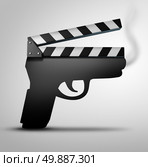 Movie violence concept or crime flick concept as a clapperboard or movie slate board shaped as a gun as a symbol for guns in television internet or movies. Стоковое фото, агентство Ingram Publishing / Фотобанк Лори