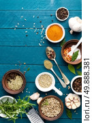 culinary background with spices on wooden table. Стоковое фото, агентство Ingram Publishing / Фотобанк Лори