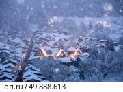Shirakawago light-up with Snowfall Gifu Chubu Japan with snowfall. Стоковое фото, агентство Ingram Publishing / Фотобанк Лори