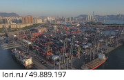 Shipping port with containers in Hong Kong. Стоковое видео, видеограф Михаил Коханчиков / Фотобанк Лори