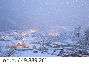 Shirakawago light-up with Snowfall Gifu Chubu Japan with snowfall. Стоковое фото, агентство Ingram Publishing / Фотобанк Лори