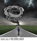 Incoming danger business concept and financial risk path as a group of 3D illustration twisted roads shaped as a dangerous tornado with a bold businessman walking towards the risk without fear as a symbol of courage. Стоковое фото, агентство Ingram Publishing / Фотобанк Лори