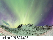 Northern Lights Aurora borealis at Vik Iceland. Стоковое фото, агентство Ingram Publishing / Фотобанк Лори