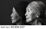 Two older women with headscarves covering their heads. They are standing together, their faces showing expressions of camaraderie and wisdom. Стоковое AI-изображение, AI-художник Данила Большаков / Фотобанк Лори
