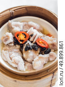 Chinese dim sum Black bean steamed pork ribs - Steamed Chinese groumet cuisine. Стоковое фото, агентство Ingram Publishing / Фотобанк Лори