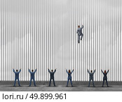 Obstacle to opportunity concept as a group of people as businessmen and businesswomen locked behind prison bars with one individual smart business leader using clever innovative thinking to climb the jail to freedom with 3D illustration elements. Стоковое фото, агентство Ingram Publishing / Фотобанк Лори