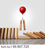 Downsizing business strategy as a balloon lifting up a pair of domino pieces allowing the gap to stop the falling dominoes as a corporate management symbol and human resources plan for long term success as a 3D illustration. Стоковое фото, агентство Ingram Publishing / Фотобанк Лори