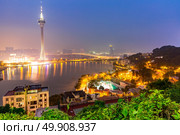 Macau Tower woth urban ladscape, Macao China at night. Стоковое фото, агентство Ingram Publishing / Фотобанк Лори