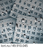 Rainy day schedule concept as a wet window with rain water drops on glass with calendar pages as a weather forecast or scheduling change due to precipitation or storm in a 3D illustration style. Стоковое фото, агентство Ingram Publishing / Фотобанк Лори