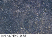 Gray background with white spray painted on a rough surface. Cement wall. Стоковое фото, агентство Ingram Publishing / Фотобанк Лори