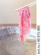 Beef Wagyu A5 Shabu shabu with steam, Groumet Japanese hot pot cuisine. Стоковое фото, агентство Ingram Publishing / Фотобанк Лори