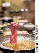 matsusaka beef A5 Wagyu Beef Shabu shabu with steam, Groumet Japanese hot pot cuisine. Стоковое фото, агентство Ingram Publishing / Фотобанк Лори
