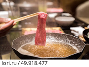 matsusaka beef A5 Wagyu Beef Shabu shabu with steam, Groumet Japanese hot pot cuisine. Стоковое фото, агентство Ingram Publishing / Фотобанк Лори