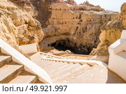 A pool of natural sea water between sandstone cliffs at Algar Seco. Carvoeiro Algarve Portugal. Стоковое фото, агентство Ingram Publishing / Фотобанк Лори