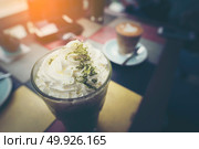 green tea frappe with whipping Cream. Стоковое фото, агентство Ingram Publishing / Фотобанк Лори