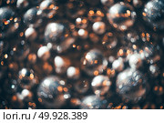 Bokeh. New Year bokeh background. Abstract background with colorful bokeh. Defocused lights. Background for Christmas cards. Beautiful blurred christmas balls. Christmas Lights. Christmas decorations. Bokeh. Christmas abstract background with colorful bokeh. Стоковое фото, агентство Ingram Publishing / Фотобанк Лори