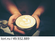 Drip coffee latte art, vintage filter image. Стоковое фото, агентство Ingram Publishing / Фотобанк Лори