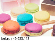 Colorful macarons on white background. Macaron is sweet meringue-based confection. Стоковое фото, агентство Ingram Publishing / Фотобанк Лори