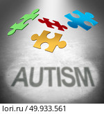 Autism puzzle symbol as an autistic child awareness icon as jigsaw pieces coming together to form text as a mental health syndrome as a 3D illustration.. Autism Puzzle. Стоковое фото, агентство Ingram Publishing / Фотобанк Лори