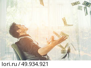Business man, rich, millionaire, billionaire, with many banknote dollars money. Стоковое фото, агентство Ingram Publishing / Фотобанк Лори