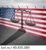 United States immigration law and US citizenship as a justice scale shadow on a border wall with 3D illustration elements.. United States Immigration Law. Стоковое фото, агентство Ingram Publishing / Фотобанк Лори