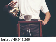 Drip brewing, filtered coffee, or pour-over is a method which involves pouring water over roasted, ground coffee beans contained in a filter. Стоковое фото, агентство Ingram Publishing / Фотобанк Лори