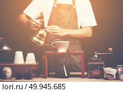 Drip brewing, filtered coffee, or pour-over is a method which involves pouring water over roasted, ground coffee beans contained in a filter. Стоковое фото, агентство Ingram Publishing / Фотобанк Лори