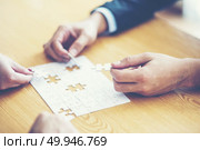 Finally finding solution concept with jigsaw. Стоковое фото, агентство Ingram Publishing / Фотобанк Лори