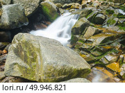 Pliu waterfall in Pliu National Rain forest park, Thailand. Стоковое фото, агентство Ingram Publishing / Фотобанк Лори