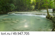 Deep forest Waterfall in Kanchanaburi, Thailand. Стоковое фото, агентство Ingram Publishing / Фотобанк Лори
