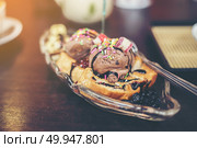 Banana split sunday ice cream in a bowl with strawberry and lemon choc vanilla ice cream scoops. Banana split sunday ice cream in a bowl with strawberry and lemo. Стоковое фото, агентство Ingram Publishing / Фотобанк Лори