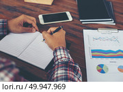 Hipster Businessman Working writing Determine Workspace Lifestyl. Hipster Businessman Working writing Determine Workspace Lifestyle Concept. Стоковое фото, агентство Ingram Publishing / Фотобанк Лори