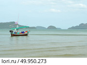 Fishing trawler on the water, Thailand. Стоковое фото, агентство Ingram Publishing / Фотобанк Лори
